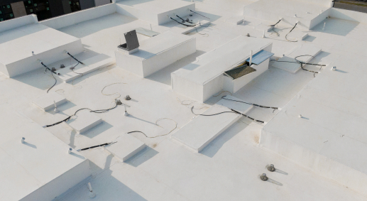Aerial view of a TPO roofing system installation